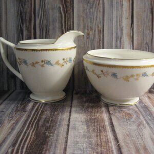 MINTON CHAMPAGNE BONE CHINA FOOTED CREAMER AND OPEN SUGAR BOWL WITH LID
